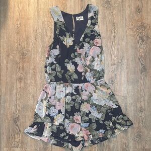 Show Me Your MuMu Blue Floral Romper with Sleeveless Design and Fitted Waist